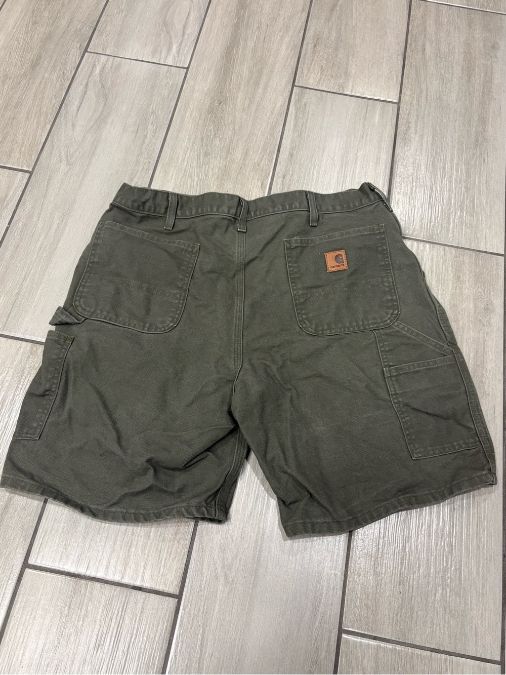 Vintage Carhartt Canvas
Carpenter Shorts Moss Green Size 38 Distressed B25 MOS